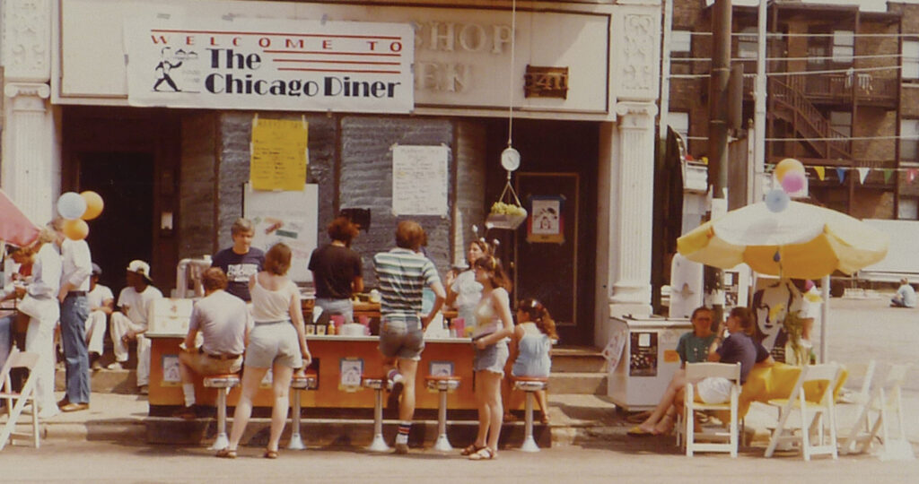About Us: historical photo of our first street fair